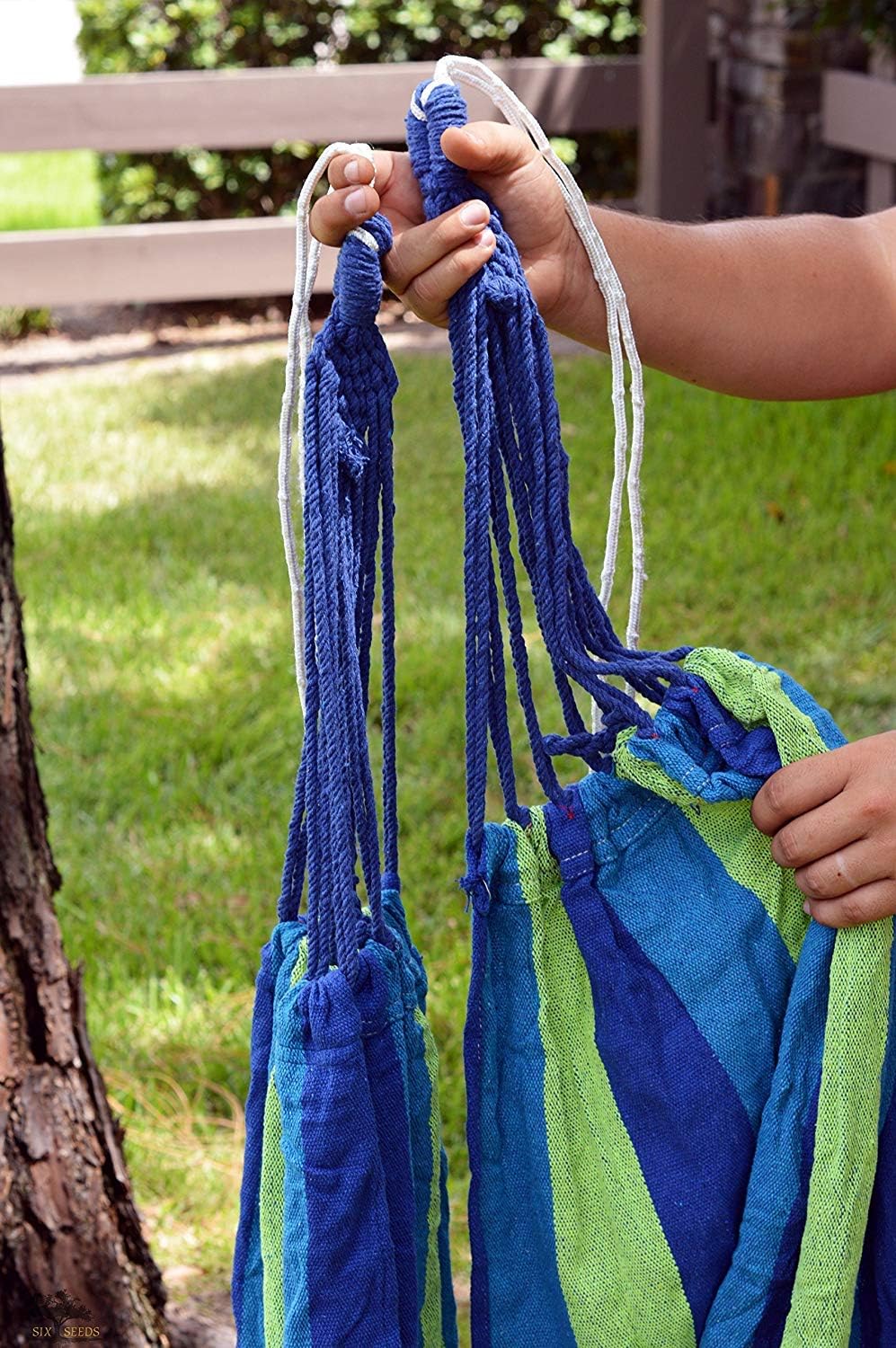 Durable cotton canvas hammock with tree straps – strong and comfortable design for outdoor and indoor relaxation, breathable fabric for ultimate comfort, easy to set up, perfect for camping, backyard, patio, or travel.
