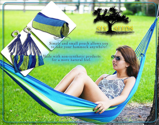 Durable cotton canvas hammock with tree straps – strong and comfortable design for outdoor and indoor relaxation, breathable fabric for ultimate comfort, easy to set up, perfect for camping, backyard, patio, or travel.