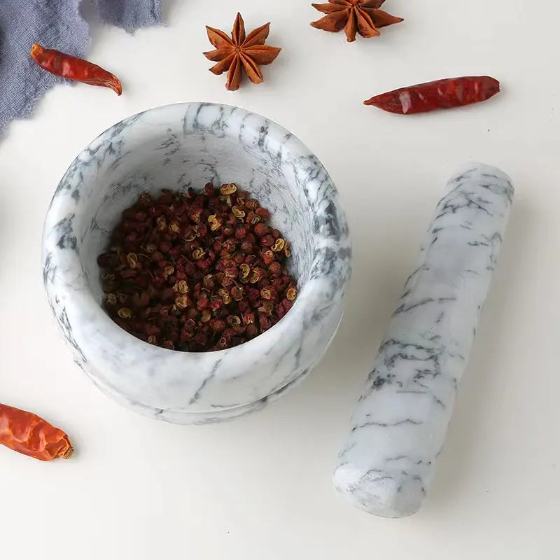 Marble mortor and pestle;
Size: 13*13*9cm;
Pestle: R5*15cm;