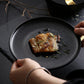 10-Inch Frosted Black Plate with Gold Rim Elegant Ceramic Dinnerware for Home and Restaurant Modern Matte Finish Durable and Scratch-Resistant for Everyday Use and Special Occasions